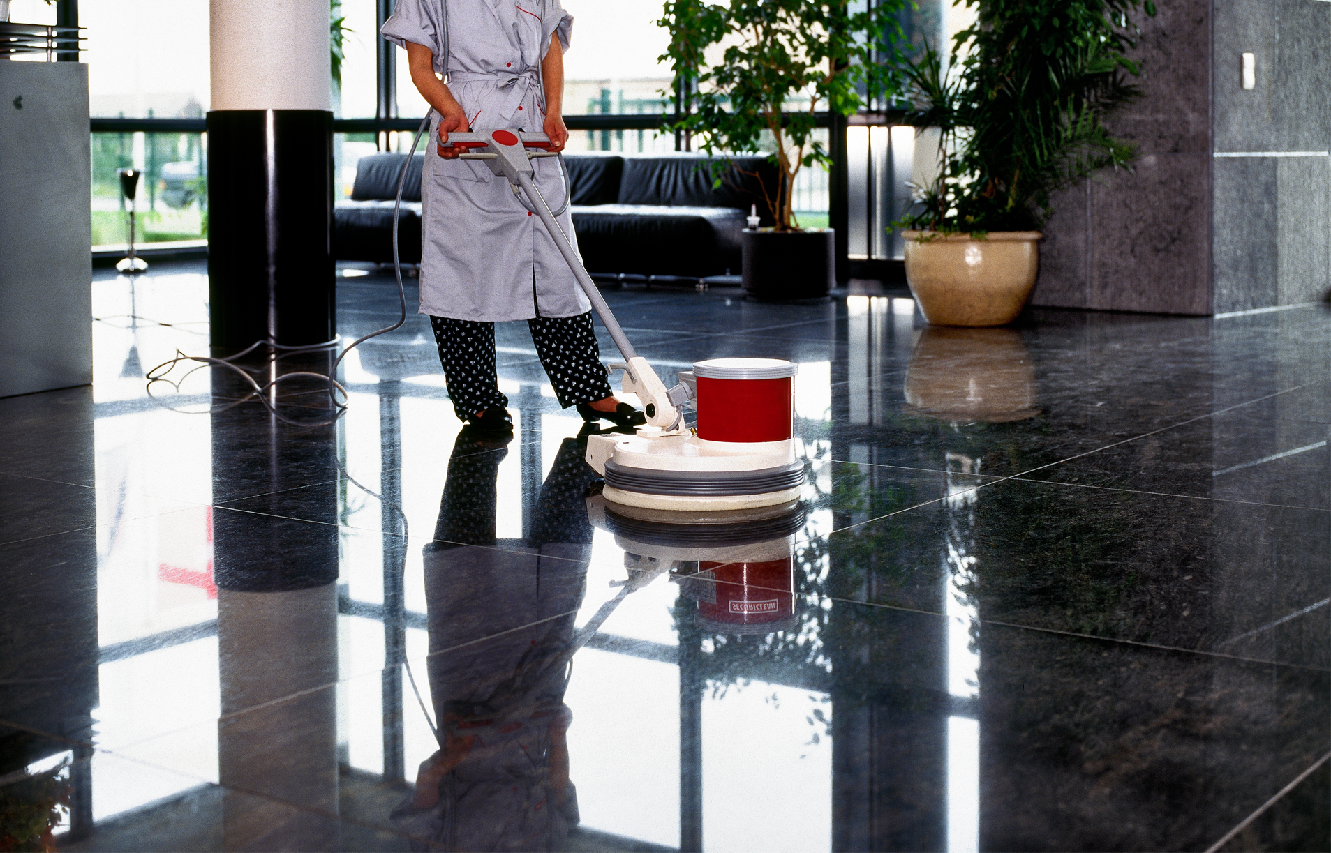 Image of a cleaner cleaning floors of a hotel | Commercial Cleaning in Kent | deep clean